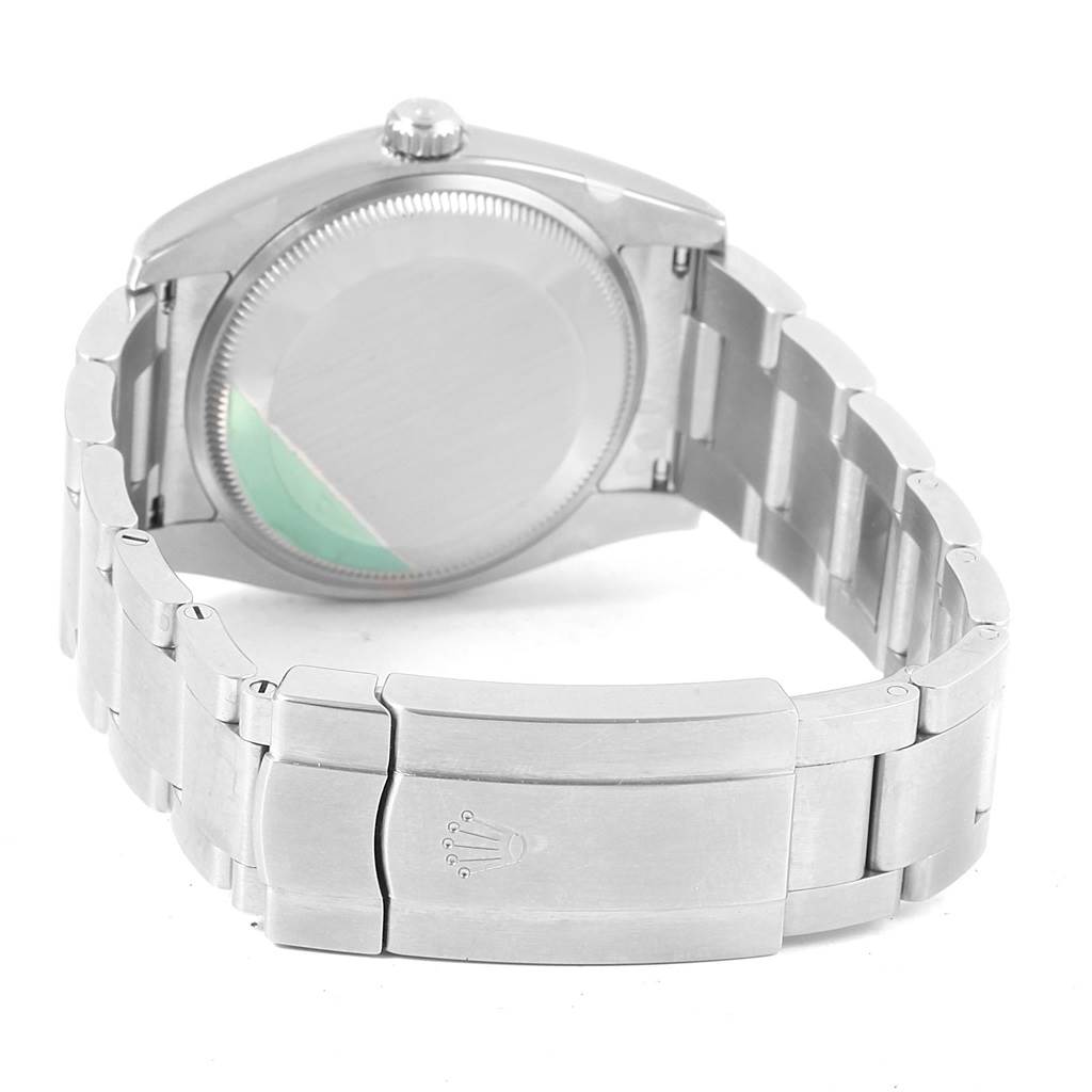 The image shows the back case, clasp, and a portion of the metal bracelet of the Rolex Air-King 114200 Men's Stainless Steel Blue Dial 114200 Men's Stainless Steel Blue Dial watch.