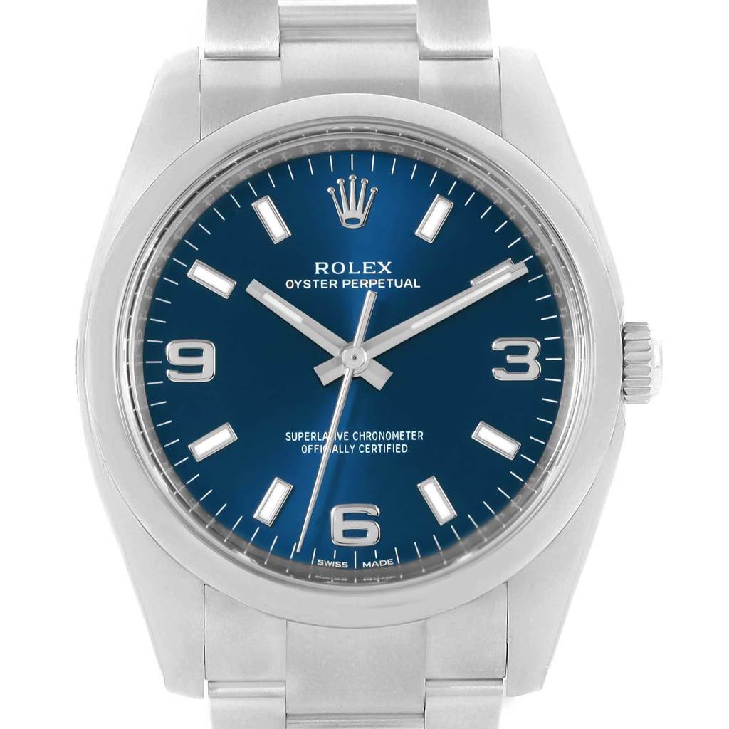 The image shows a front view of a Rolex Air-King 114200 Men's Stainless Steel Blue Dial 114200 Men's Stainless Steel Blue Dial watch, displaying its dial, hands, numbers, and part of the bracelet.