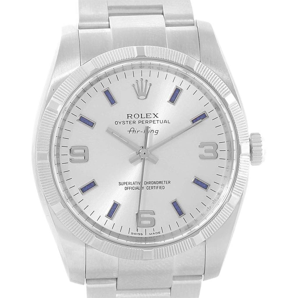 The image shows a front view of the Rolex Air-King 114210 Men's Stainless Steel Silver Dial 114210 Men's Stainless Steel Silver Dial, displaying the dial, hands, bezel, and part of the bracelet.