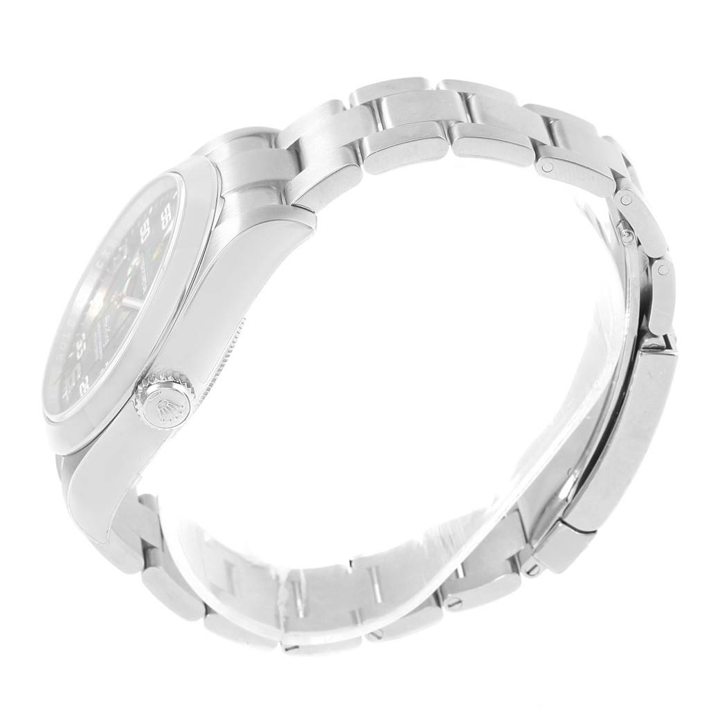 This image shows a side view of a Rolex Air-King 116900 Men's Stainless Steel Black Dial 116900 Men's Stainless Steel Black Dial watch focusing on the bracelet, clasp, case, and crown.