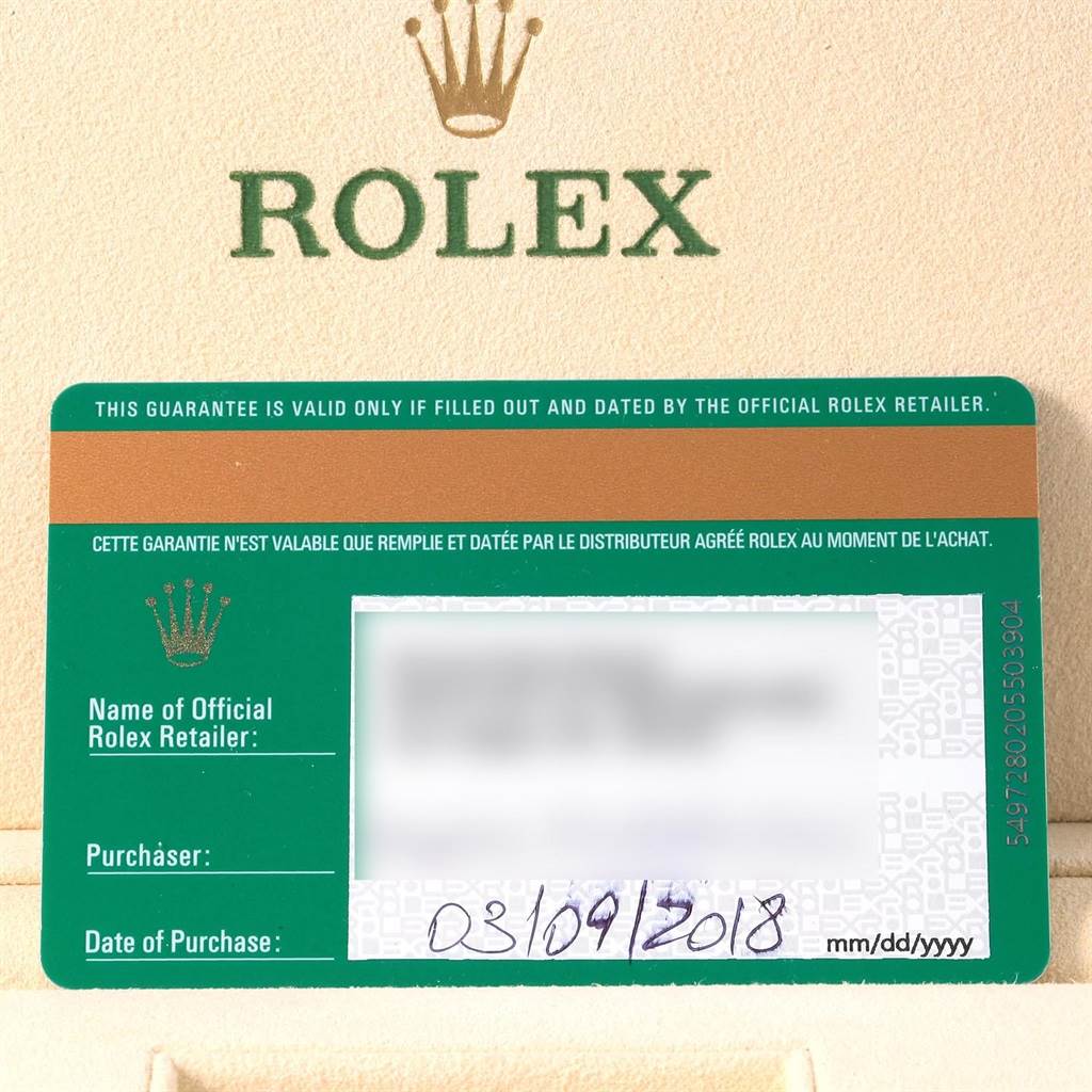 This image shows the warranty card and packaging for a Rolex Air-King 116900 Men's Stainless Steel Black Dial 116900 Men's Stainless Steel Black Dial watch.