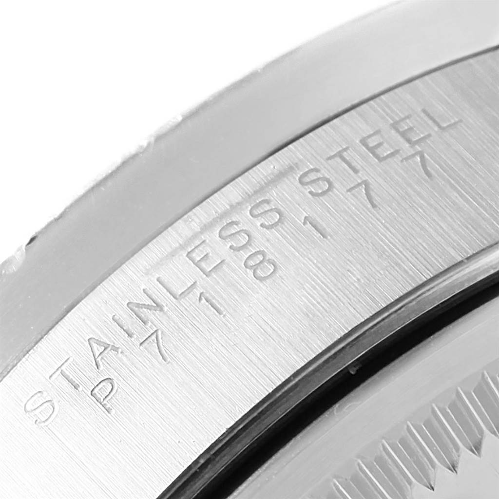 Close-up of the side of a Rolex Air-King 14010 Men's Stainless Steel Blue Dial 14010 Men's Stainless Steel Blue Dial watch, showing the "Stainless Steel" engraving.
