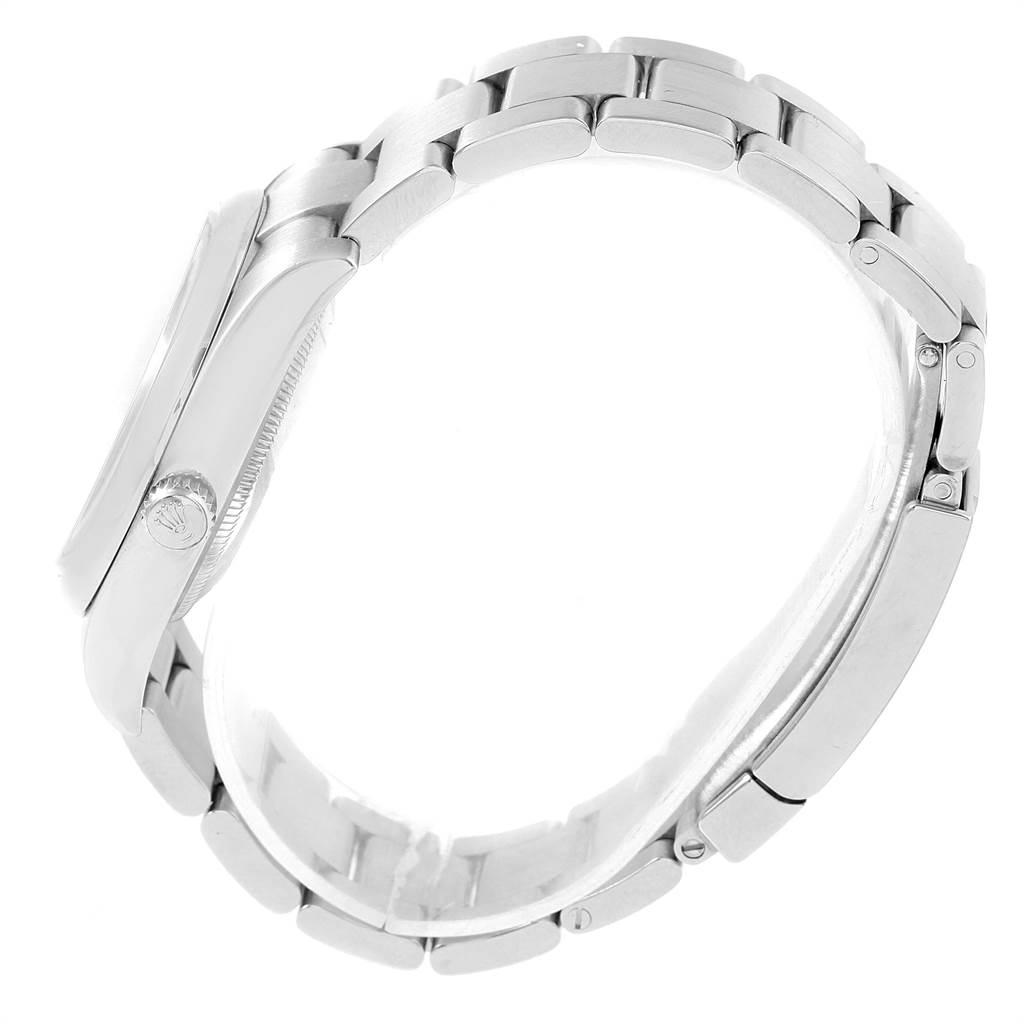 The image shows a side profile view of the Rolex Air-King 114200 Men's Stainless Steel Silver Dial 114200 Men's Stainless Steel Silver Dial watch highlighting its case, crown, and metal bracelet.