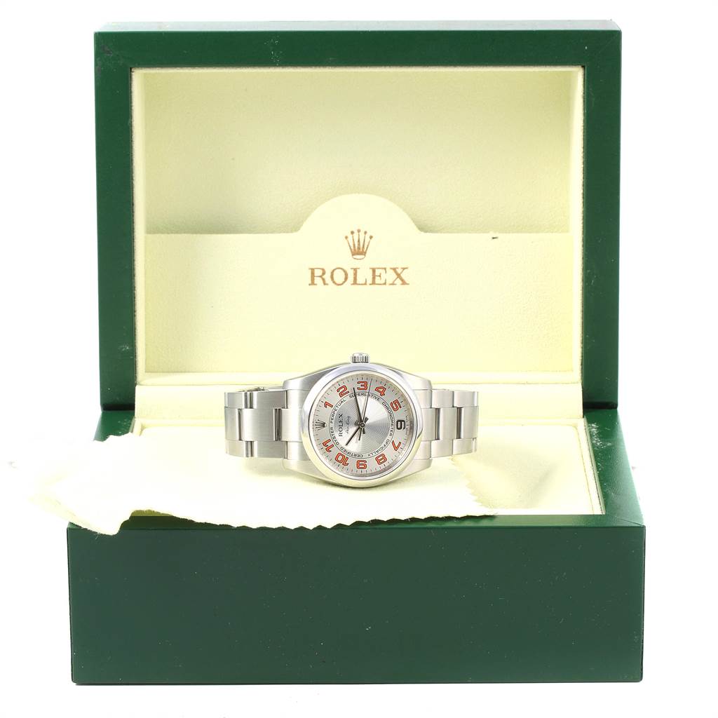 The image shows a Rolex Air-King 114200 Men's Stainless Steel Silver Dial 114200 Men's Stainless Steel Silver Dial watch in a green and yellow Rolex box, displayed from the front.