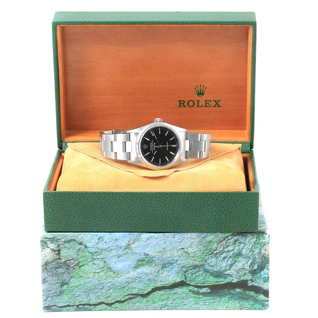 The Rolex Air-King 14000 Men's Stainless Steel Black Dial 14000 Men's Stainless Steel Black Dial watch is shown front-facing, displayed inside an open green and wooden Rolex box.