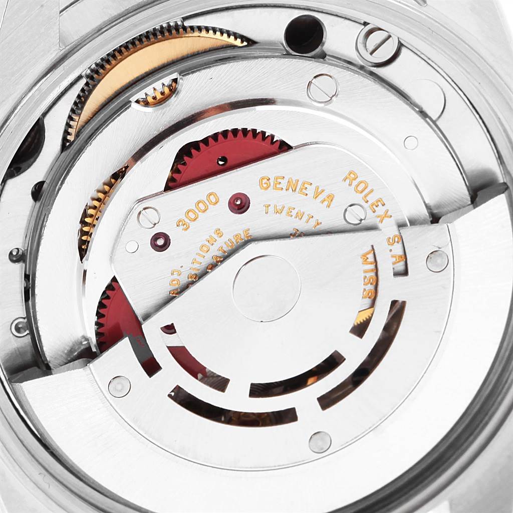 This is a close-up view of the internal mechanism of the Rolex Air-King 14000 Men's Stainless Steel Black Dial 14000 Men's Stainless Steel Black Dial showing gears and the rotor.