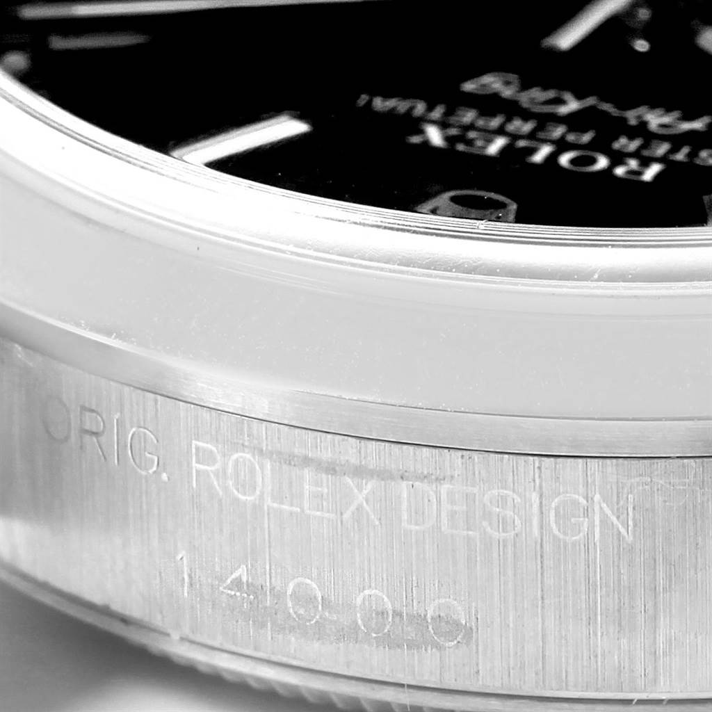 This image shows a close-up side angle of a Rolex Air-King 14000 Men's Stainless Steel Black Dial 14000 Men's Stainless Steel Black Dial watch, highlighting the bezel and engraved case.
