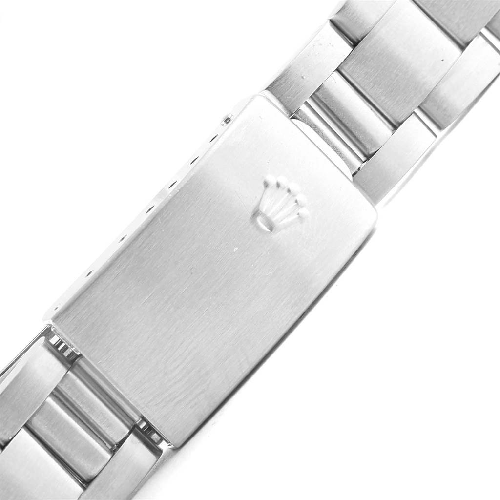 This image shows the clasp of a Rolex Air-King 14000 Men's Stainless Steel Black Dial 14000 Men's Stainless Steel Black Dial watch bracelet from a top-down angle.