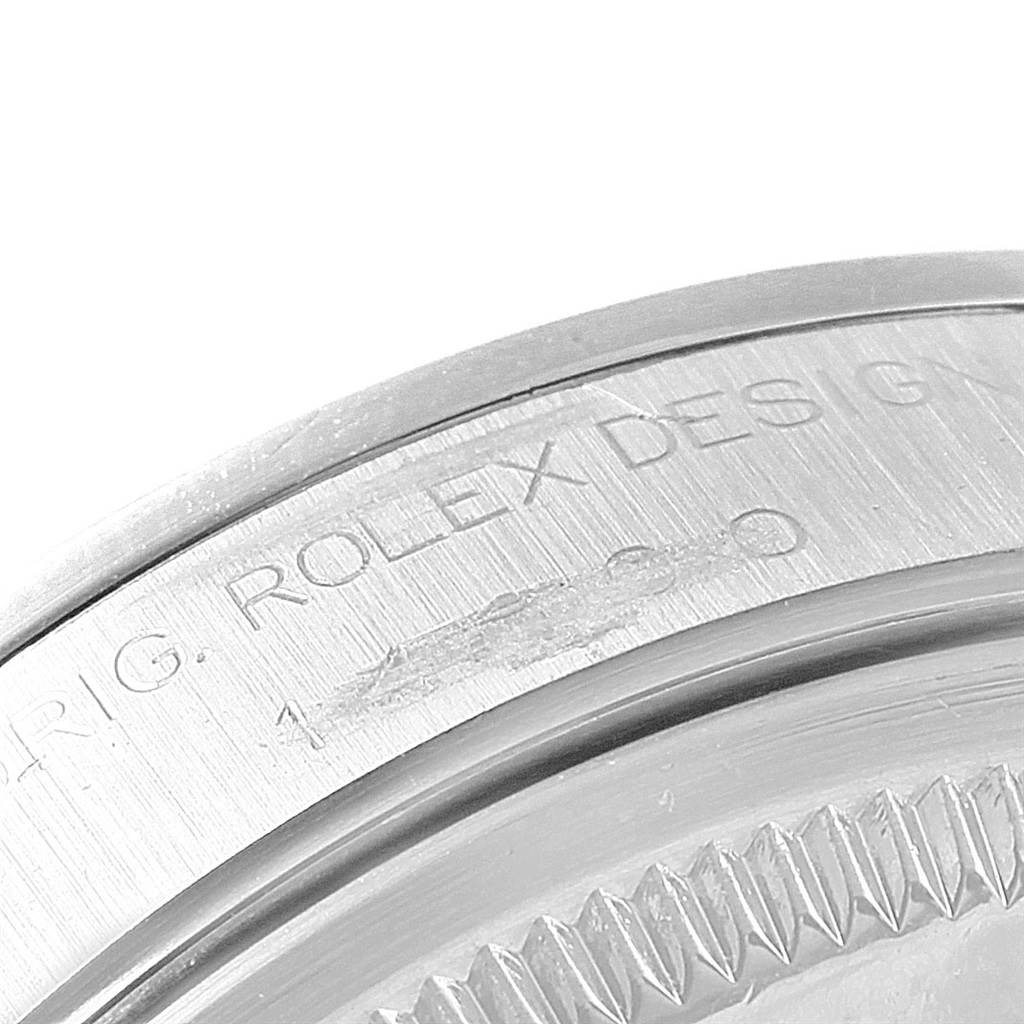 The image shows a close-up of the engraved edge and design details of a Rolex Air-King 14000 Men's Stainless Steel Black Dial 14000 Men's Stainless Steel Black Dial watch case.