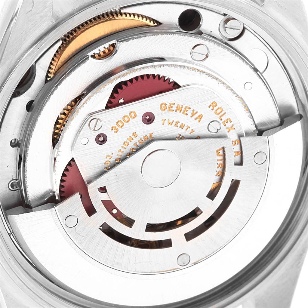 The image shows an internal view of the Rolex Air-King 14000 Men's Stainless Steel Black Dial 14000 Men's Stainless Steel Black Dial watch, highlighting its intricate movement mechanism.