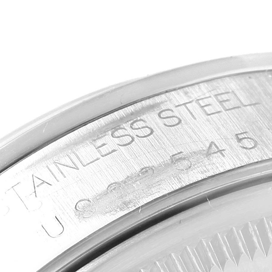 This close-up angle shows the stainless steel marking and part of the case back of the Rolex Air-King 14000 Men's Stainless Steel Black Dial 14000 Men's Stainless Steel Black Dial watch.
