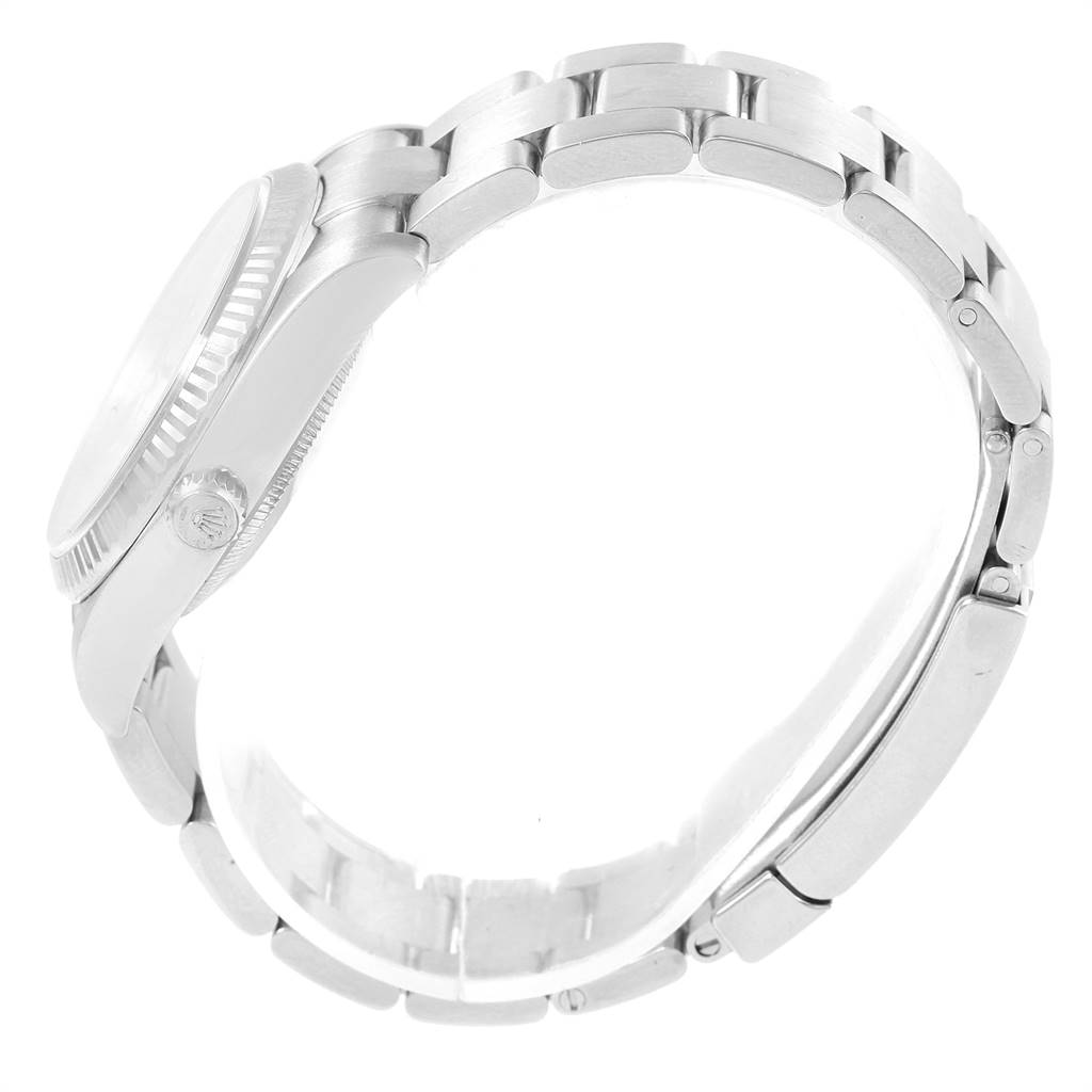 This image shows a side view of the Rolex Air-King 114234 Men's Stainless Steel Silver Dial 114234 Men's Stainless Steel Silver Dial watch, highlighting its case, crown, and bracelet.