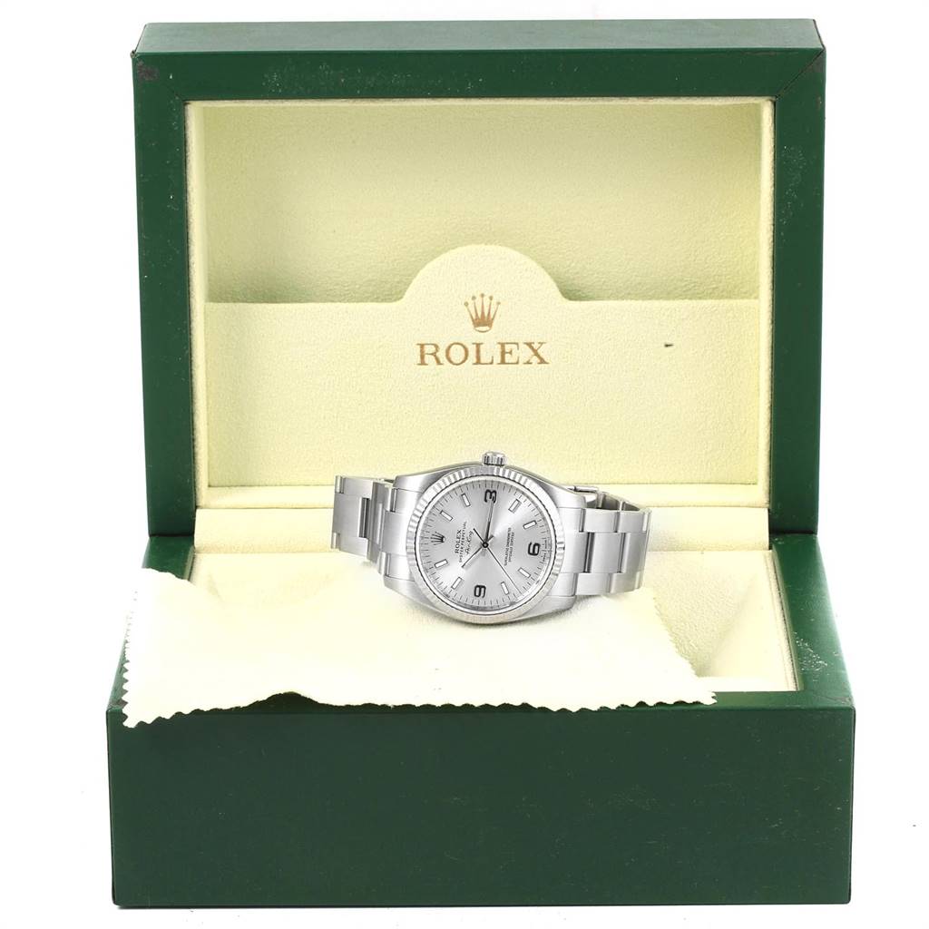 The Rolex Air-King 114234 Men's Stainless Steel Silver Dial 114234 Men's Stainless Steel Silver Dial watch is shown from the front in an open display box with a visible bracelet and dial.