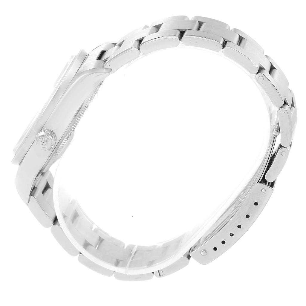 The image shows a Rolex Air-King 14010 Men's Stainless Steel Blue Dial 14010 Men's Stainless Steel Blue Dial watch from a side angle, highlighting the bracelet and crown.