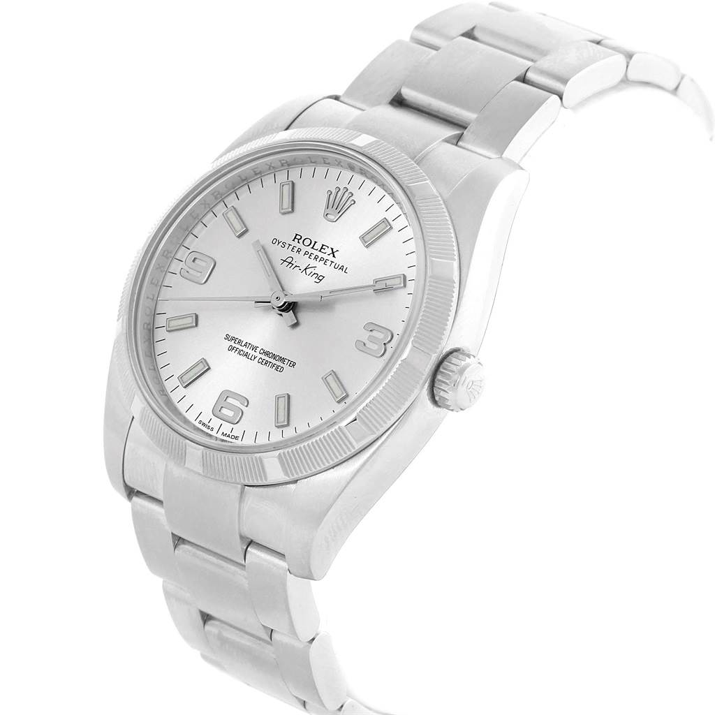 The Rolex Air-King 114210 Men's Stainless Steel Silver Dial 114210 Men's Stainless Steel Silver Dial watch is shown at a slight angle, displaying the face, crown, and part of the bracelet.