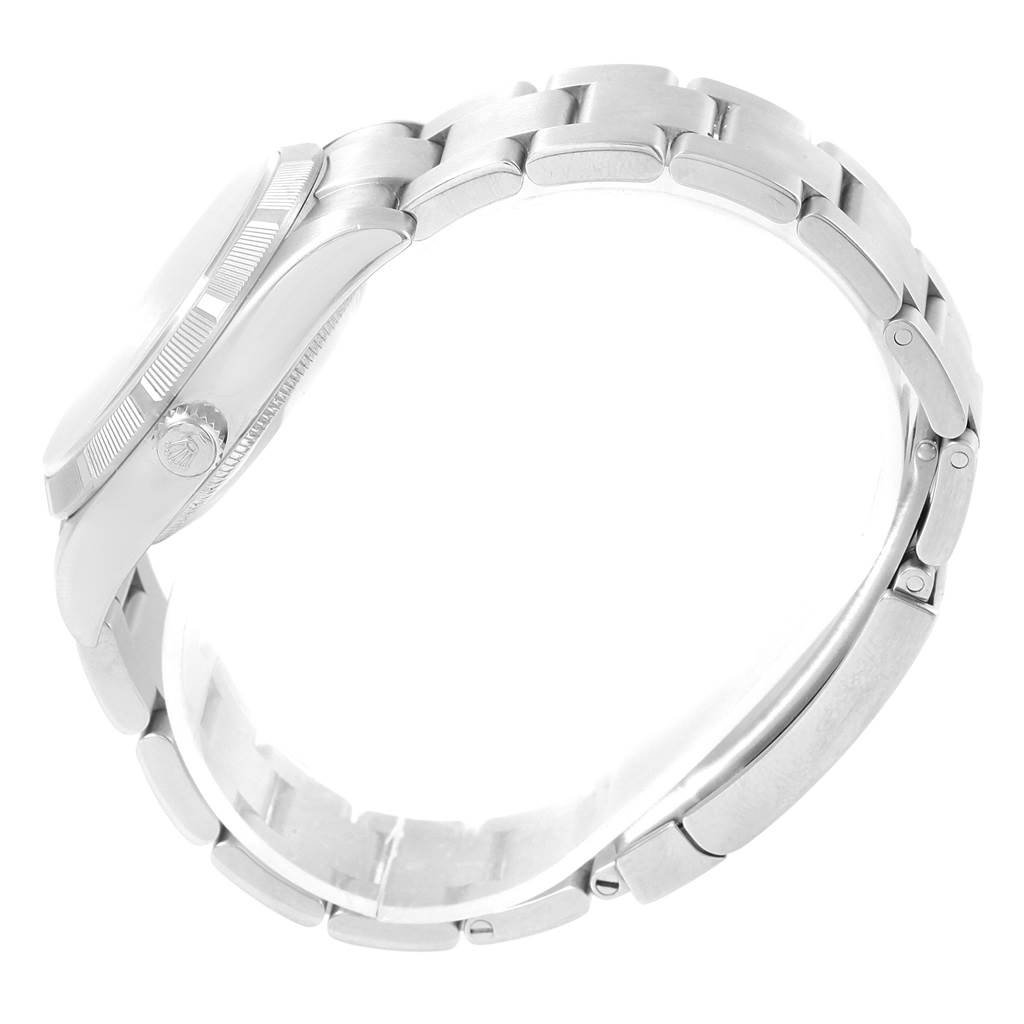 The image shows a side view of the Rolex Air-King 114210 Men's Stainless Steel Blue Dial 114210 Men's Stainless Steel Blue Dial watch band and case.