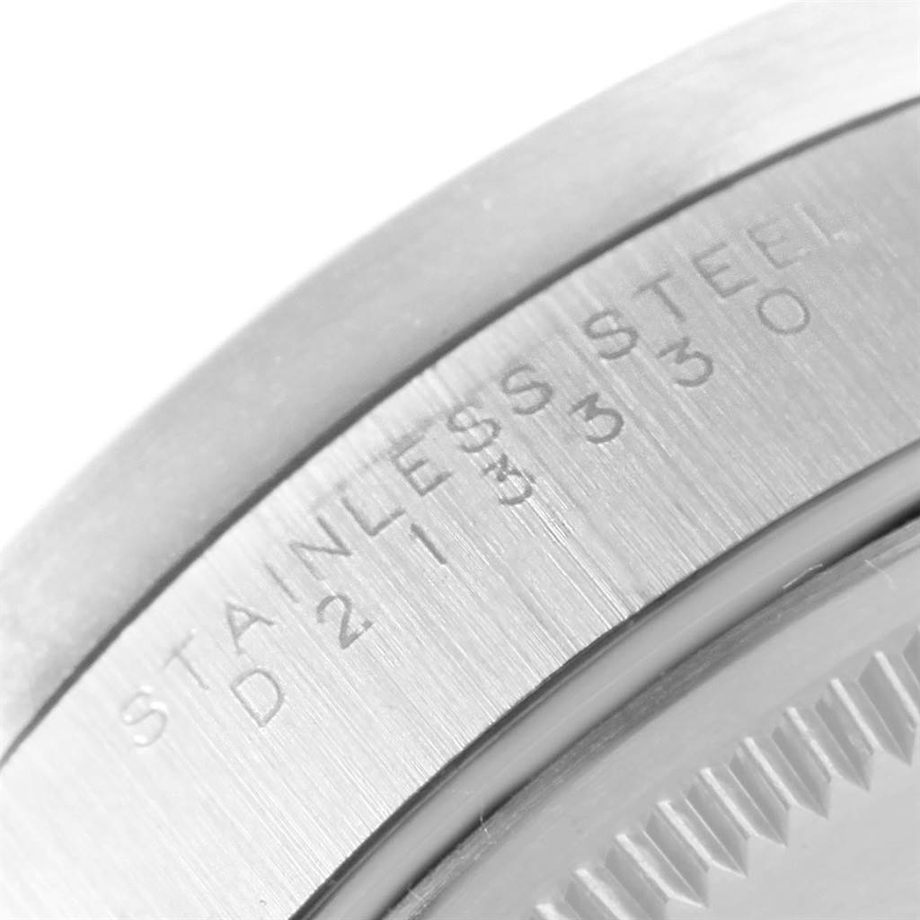This close-up image shows the stainless steel case back with engraving of the Rolex Air-King 14010 Men's Stainless Steel White Dial 14010 Men's Stainless Steel White Dial watch.