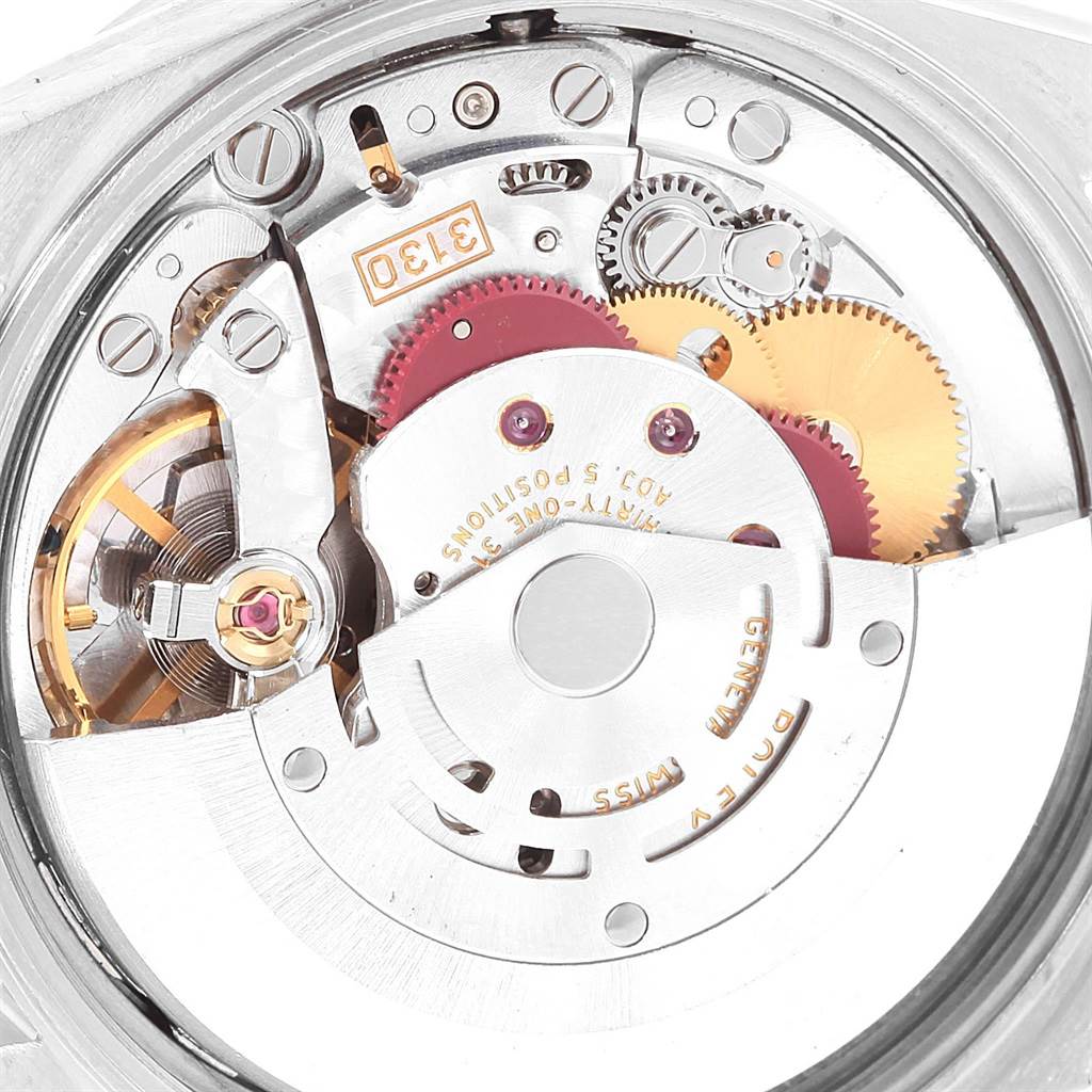 This is a close-up view of the Rolex Air-King 14010 Men's Stainless Steel White Dial 14010 Men's Stainless Steel White Dial watch, showcasing its intricate internal mechanical components.