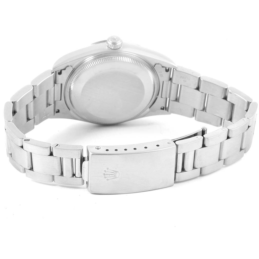 The image shows the back case and bracelet clasp of a Rolex Air-King A643381 Men's Stainless Steel Blue Dial A643381 Men's Stainless Steel Blue Dial watch from a rear angle.