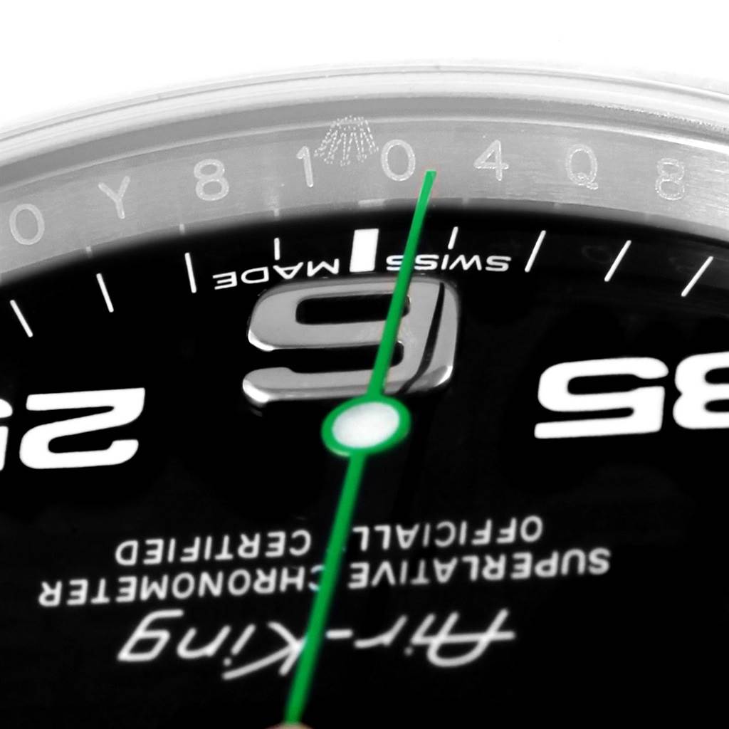This is a close-up view of the dial of the Rolex Air-King 116900 Men's Stainless Steel Black Dial 116900 Men's Stainless Steel Black Dial watch, highlighting details like the "9," seconds hand, and text.