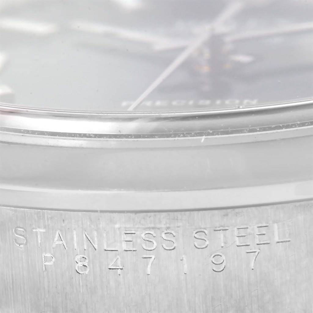 The image shows a close-up of the side viewing angles of a Rolex Air-King 14000 Men's Stainless Steel Blue Dial 14000 Men's Stainless Steel Blue Dial watch, focusing on the stainless steel case and model engraving.