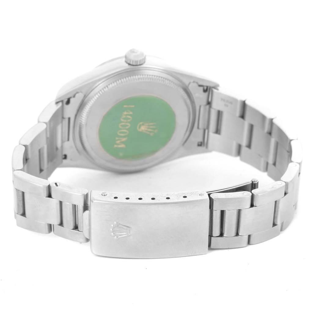 The image shows the back view of a Rolex Air-King 14000 Men's Stainless Steel Blue Dial 14000 Men's Stainless Steel Blue Dial watch, highlighting the case back, bracelet, and clasp.