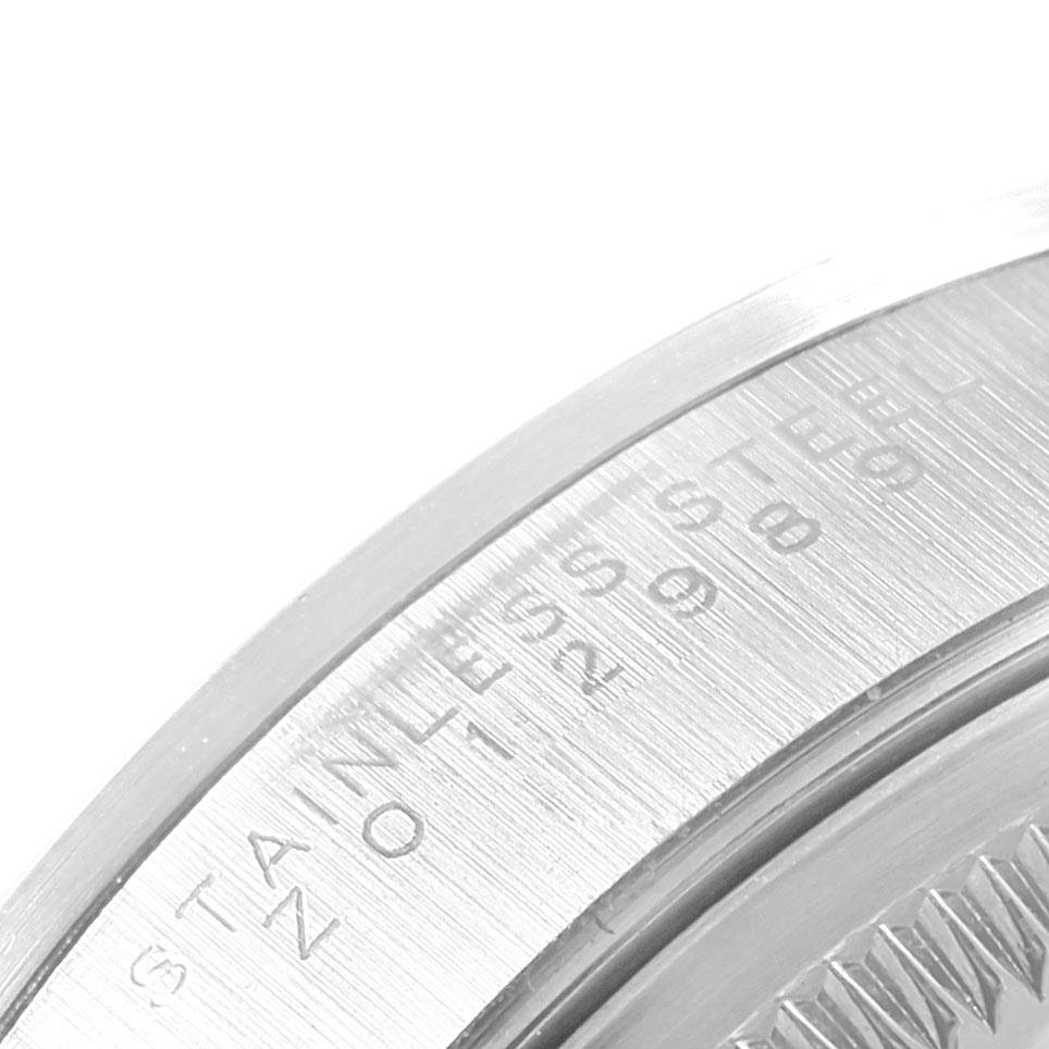 This image shows a close-up of the side engraving on the casing of a Rolex Air-King 14000 Men's Stainless Steel White Dial 14000 Men's Stainless Steel White Dial watch, displaying the "Stainless Steel" inscription.