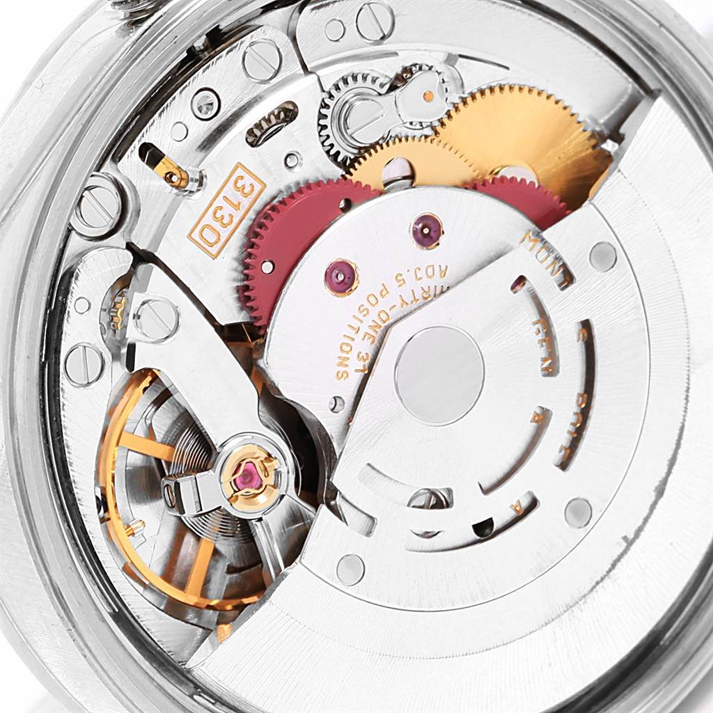This image shows the intricate internal mechanism of a Rolex Air-King 14000 Men's Stainless Steel Black Dial 14000 Men's Stainless Steel Black Dial watch, highlighting its gears and movement components.