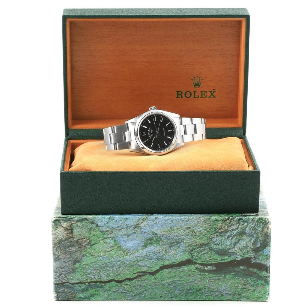 The image shows a Rolex Air-King 14000 Men's Stainless Steel Black Dial 14000 Men's Stainless Steel Black Dial watch with a black dial and silver bracelet, presented in an open Rolex box.