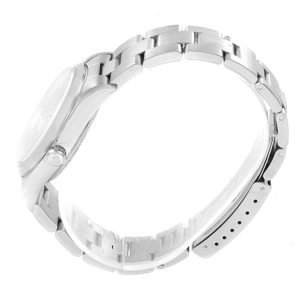 The image shows a side view of a Rolex Air-King 14000 Men's Stainless Steel Black Dial 14000 Men's Stainless Steel Black Dial watch focusing on its stainless steel case and bracelet.