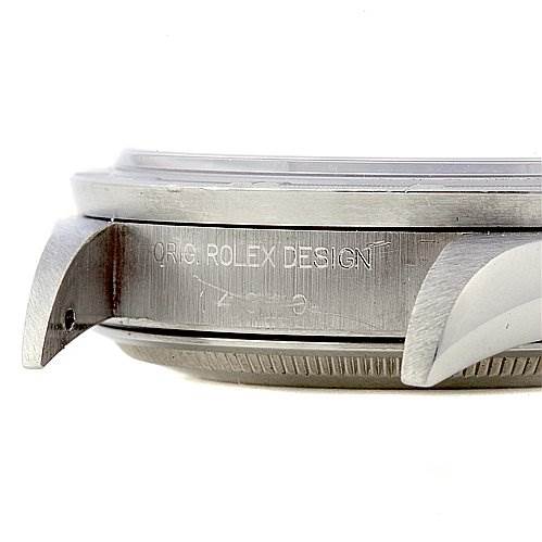 The image shows a side view of the case of an Air-King watch by Rolex, focusing on the lugs and the engraving.