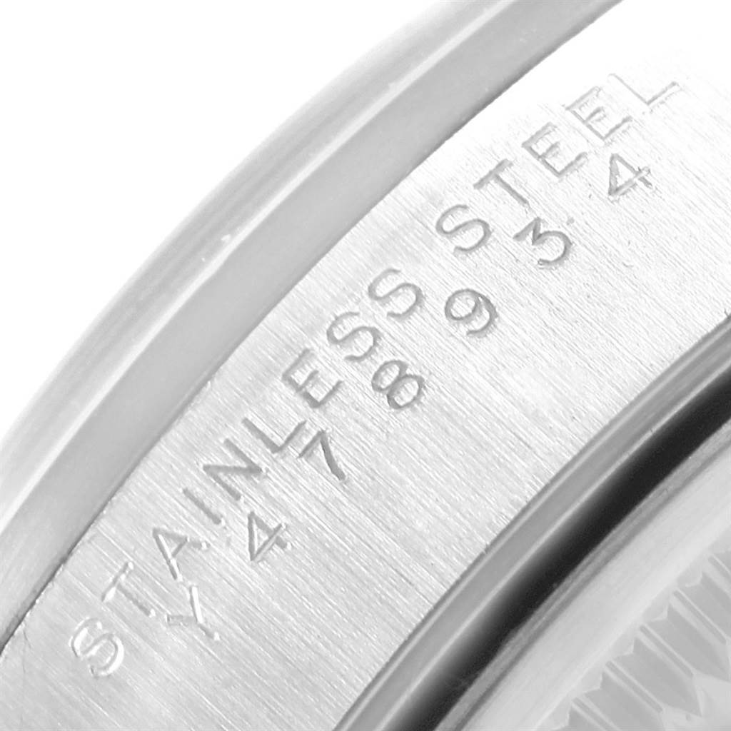 This image shows a close-up of the inner engraving on the stainless steel case of a Rolex Air-King 14000 Men's Stainless Steel White Dial 14000 Men's Stainless Steel White Dial watch.