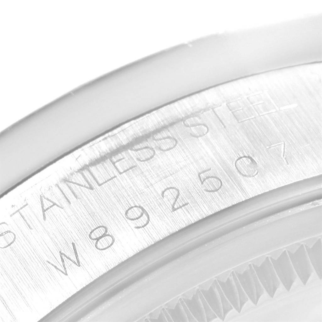 This image shows a close-up view of the stainless steel casing and serial number of a Rolex Air-King 14010 Men's Stainless Steel Black Dial 14010 Men's Stainless Steel Black Dial watch.