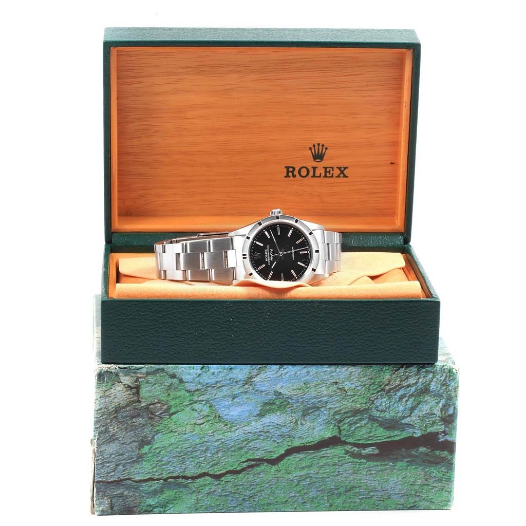 The image shows a Rolex Air-King 14010 Men's Stainless Steel Black Dial 14010 Men's Stainless Steel Black Dial watch face-on in an open green and orange Rolex box.