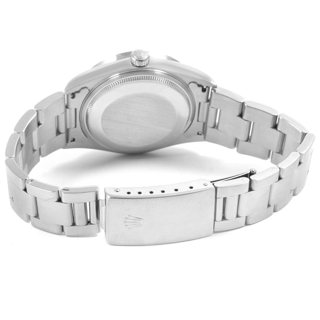 The image shows the back view of a Rolex Air-King 14010 Men's Stainless Steel Black Dial 14010 Men's Stainless Steel Black Dial watch, highlighting its metal bracelet and clasp.