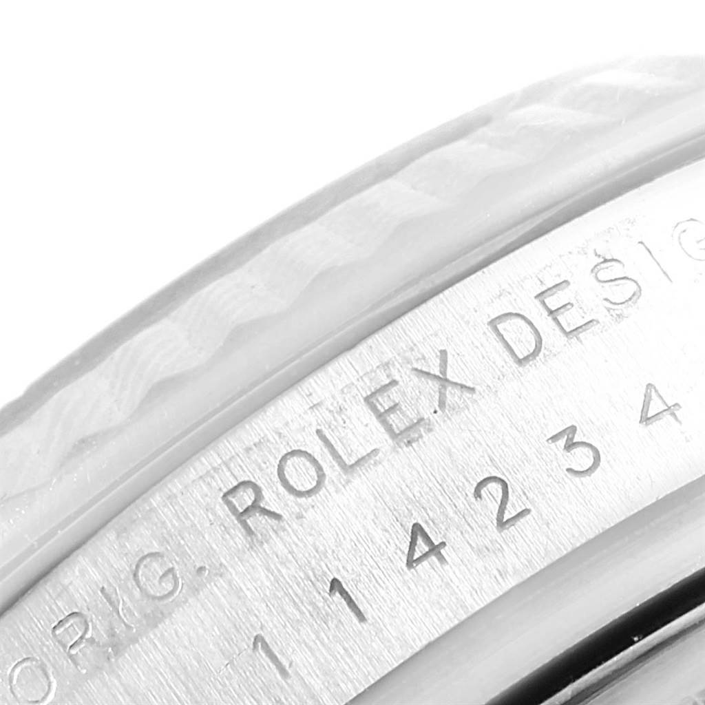 This image shows a close-up of the model number engraving on the casing of a Rolex Air-King 114234 Men's Stainless Steel White Dial 114234 Men's Stainless Steel White Dial watch.