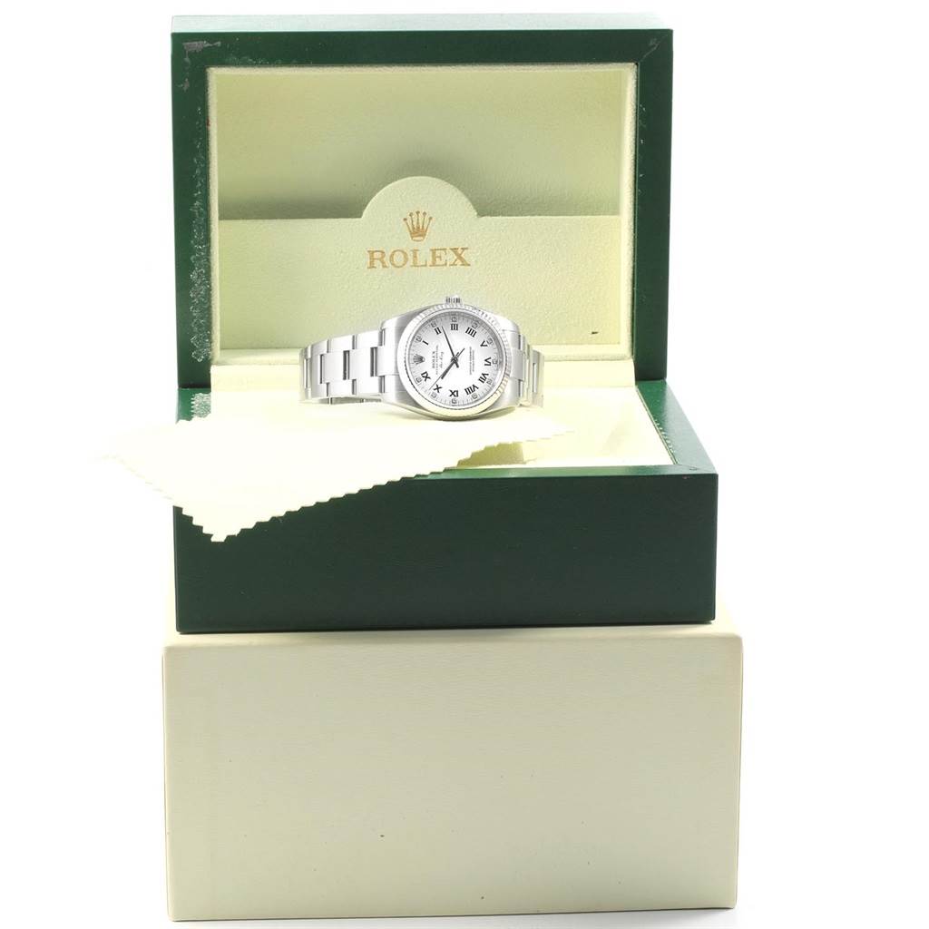 The image shows a Rolex Air-King 114234 Men's Stainless Steel White Dial 114234 Men's Stainless Steel White Dial watch at an angle inside an open green Rolex box with a cloth.