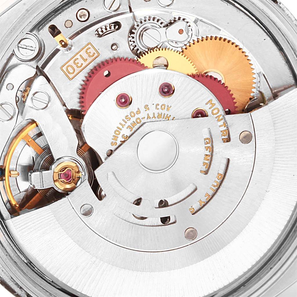 The image shows the intricate movement and internal mechanics of the Rolex Air-King 114234 Men's Stainless Steel White Dial 114234 Men's Stainless Steel White Dial watch from a rear angle.