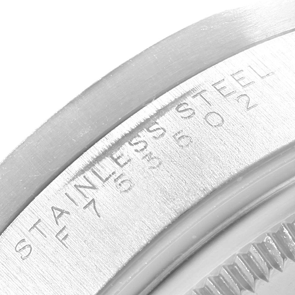 The close-up image shows the stainless steel case back and part of the bezel of a Rolex Air-King 14010 Men's Stainless Steel Black Dial 14010 Men's Stainless Steel Black Dial watch.