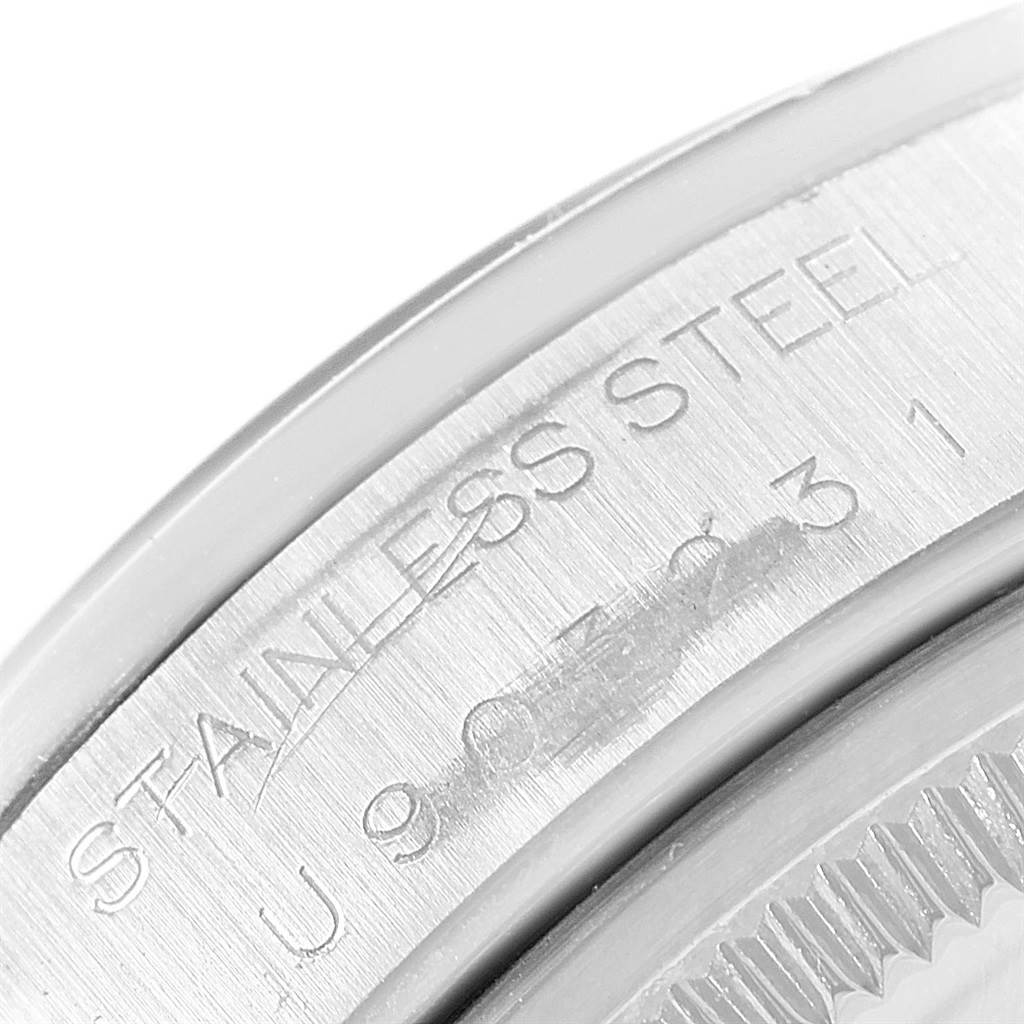 This image shows a close-up of the engraved case back edge of a Rolex Air-King 14000 Men's Stainless Steel Black Dial 14000 Men's Stainless Steel Black Dial, indicating its stainless steel composition.