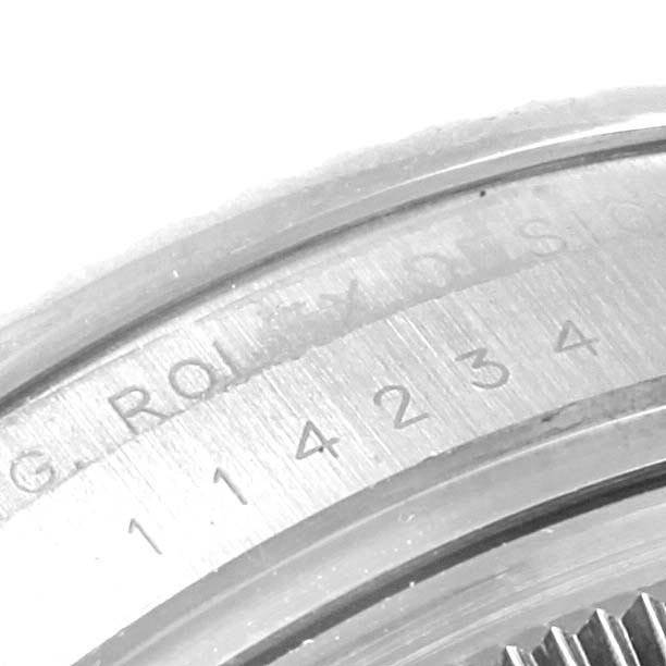 The image shows a close-up of the side of the case of a Rolex Air-King 114234 Men's Stainless Steel Black Dial 114234 Men's Stainless Steel Black Dial watch, displaying the model number and part of the engraved text.