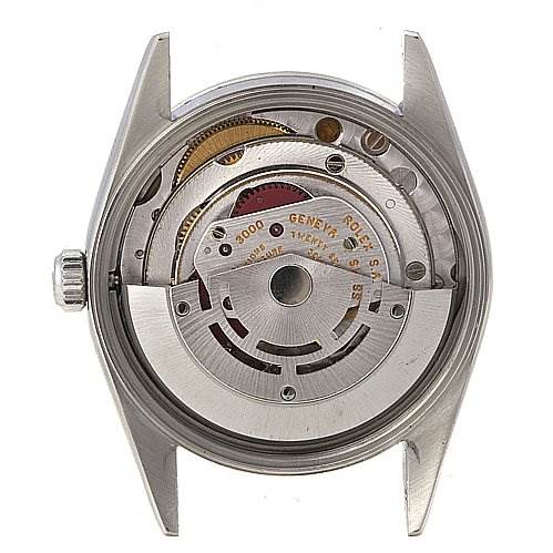 The image shows the back view of a disassembled Rolex Air-King 14000 Men's Stainless Steel Blue Dial 14000 Men's Stainless Steel Blue Dial watch, displaying its intricate internal mechanical movement components.