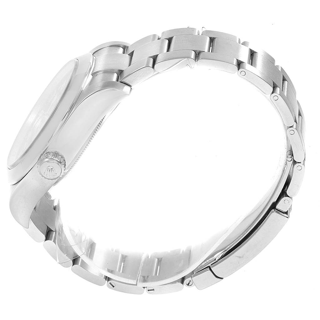 The image shows a side view of the Rolex Air-King 116900 Men's Stainless Steel Black Dial 116900 Men's Stainless Steel Black Dial watch, highlighting the stainless steel bracelet, case side, and crown.