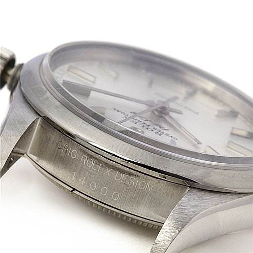 The image shows a close-up side angle of the Rolex Air-King 1400 Men's Stainless Steel Silver Dial 1400 Men's Stainless Steel Silver Dial watch, highlighting the bezel, case, and engraving.
