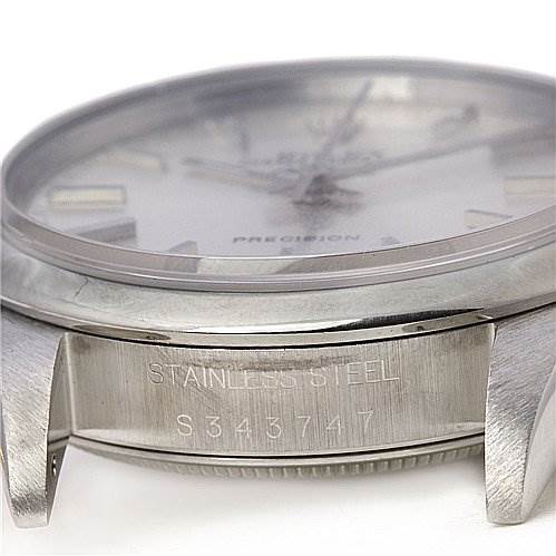 This image shows the side view of the stainless steel case and lugs of a Rolex Air-King 1400 Men's Stainless Steel Silver Dial 1400 Men's Stainless Steel Silver Dial watch, highlighting the serial number.