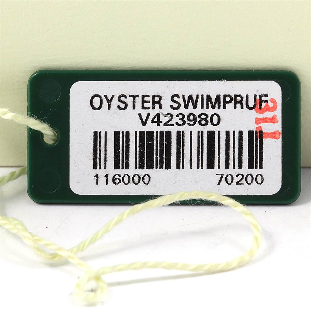 This image shows a tag labeled "Oyster Swimpruf" with barcodes, related to the Rolex Air-King 116000 Men's Stainless Steel Silver Dial 116000 Men's Stainless Steel Silver Dial model.