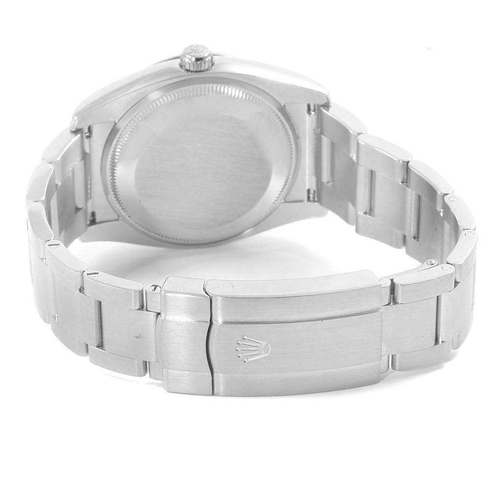 The image shows the back view of the Rolex Air-King 114234 Men's Stainless Steel Silver Dial 114234 Men's Stainless Steel Silver Dial, highlighting the case back, crown, and a partially open stainless steel bracelet.