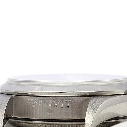 The image shows a side view of the Rolex Air-King 14000M Men's Stainless Steel Silver Dial 14000M Men's Stainless Steel Silver Dial watch, focusing on the stainless steel case and serial number engraving.