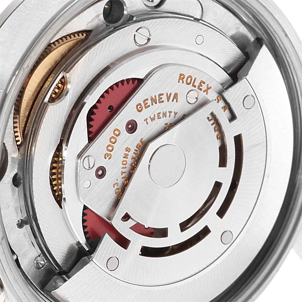 The image shows a detailed view of the movement inside a Rolex Air-King 14000 Men's Stainless Steel Silver Dial 14000 Men's Stainless Steel Silver Dial watch, highlighting gears and mechanical components.