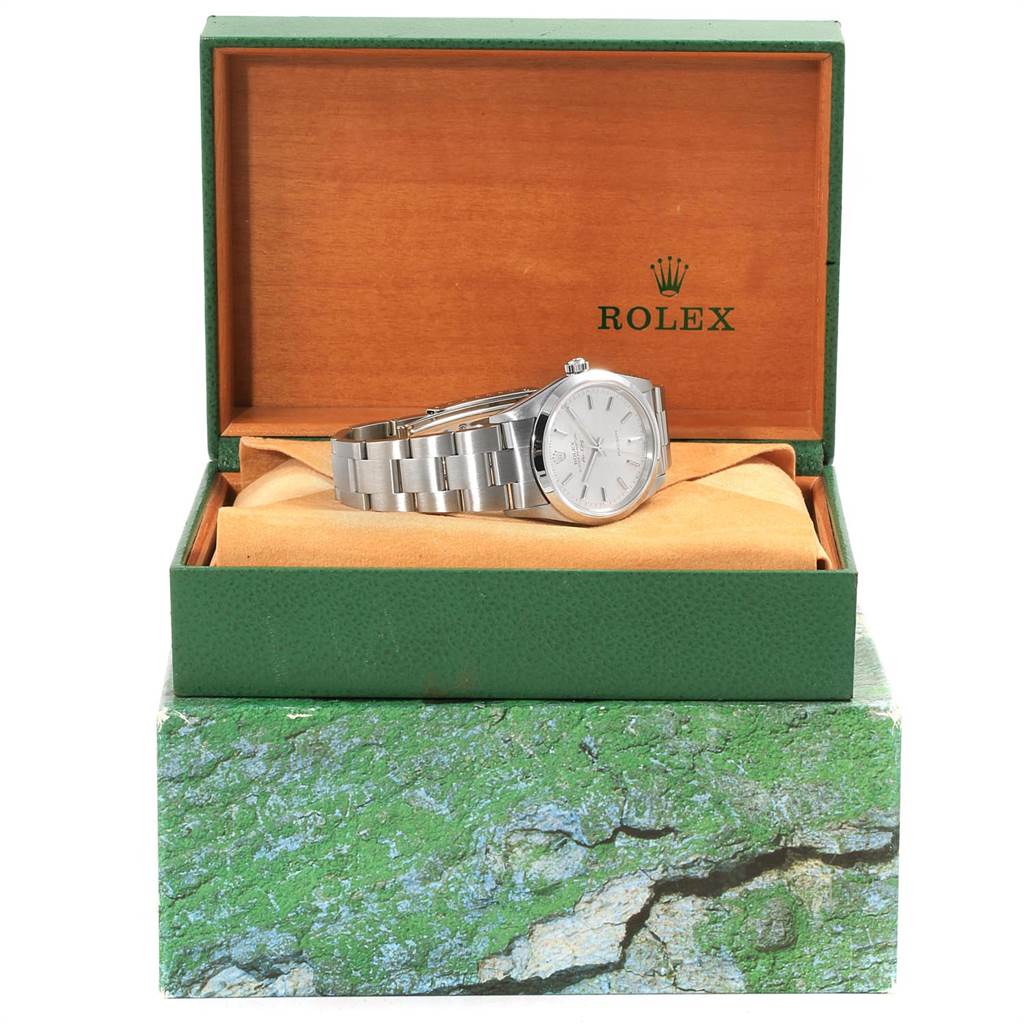 This Rolex Air-King 14000 Men's Stainless Steel Silver Dial 14000 Men's Stainless Steel Silver Dial watch is shown inside an open green and orange Rolex box, viewed from a frontal angle.